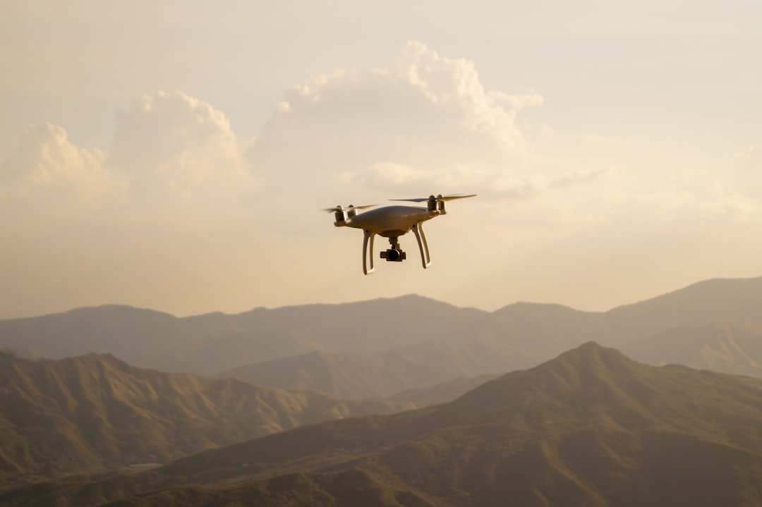 drone flying over mountains